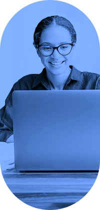 woman with glasses at computer